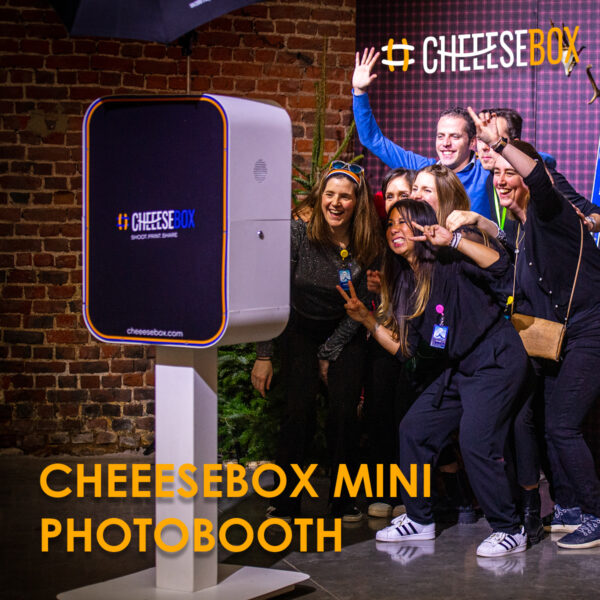 a group of people posing for a photobooth